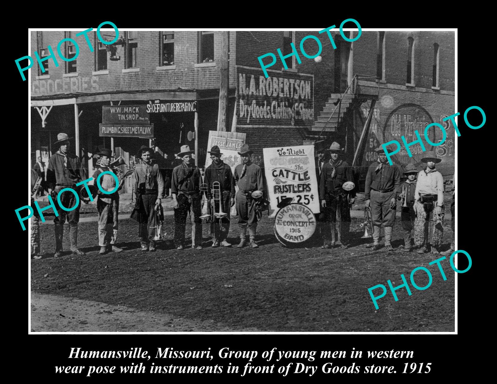 OLD LARGE HISTORIC PHOTO OF HUMANSVILLE MISSOURI TOWNBAND IN FRONT OF STORE 1915