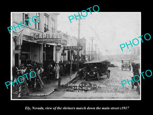 OLD LARGE HISTORIC PHOTO OF ELY NEVADA, SHRINERS MARCHING DOWN MAIN STREET c1917