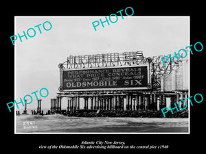 OLD HISTORIC PHOTO OF ATLANTIC CITY NEW JERSEY, OLDSMOBILE SIX BILLBOARD c1940