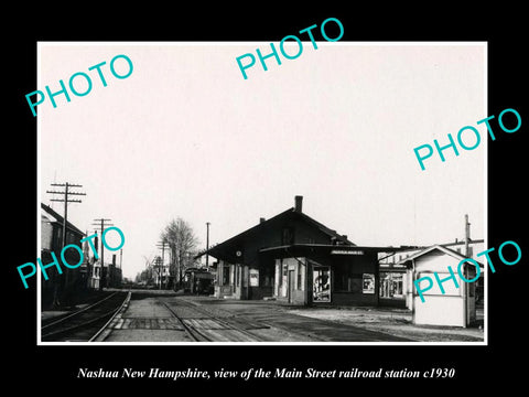 OLD LARGE HISTORIC PHOTO OF NASHUA NEW HAMPSHIRE, MAIN St RAILROAD STATION c1930