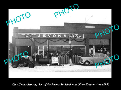 OLD LARGE HISTORIC PHOTO OF CLAY CENTER KANSAS, THE JEVONS MOTOR Co GARAGE c1950